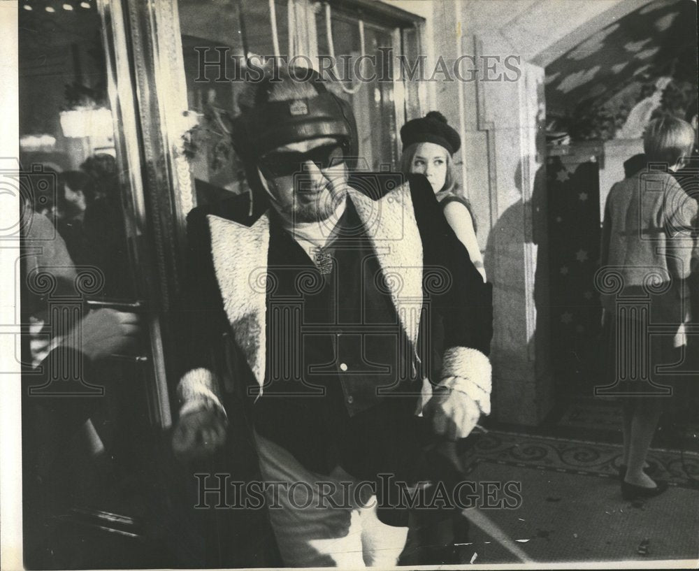 1969 Man wearing a helmet-type headgear - Historic Images