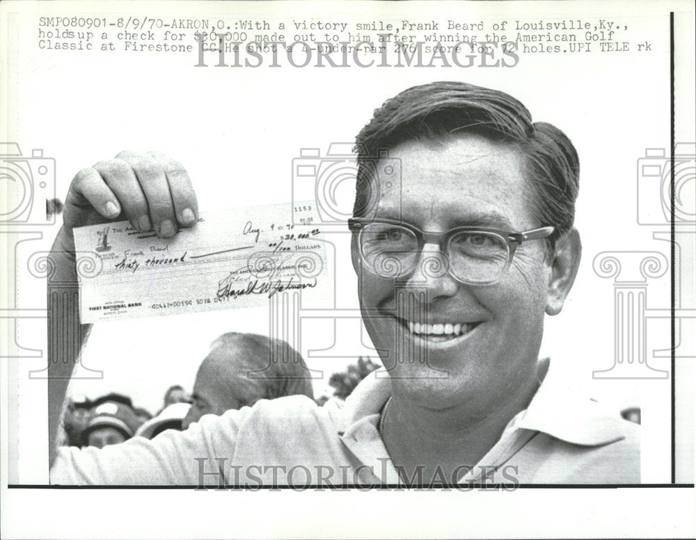 1970 Golf Player Shows Winning Check - Historic Images