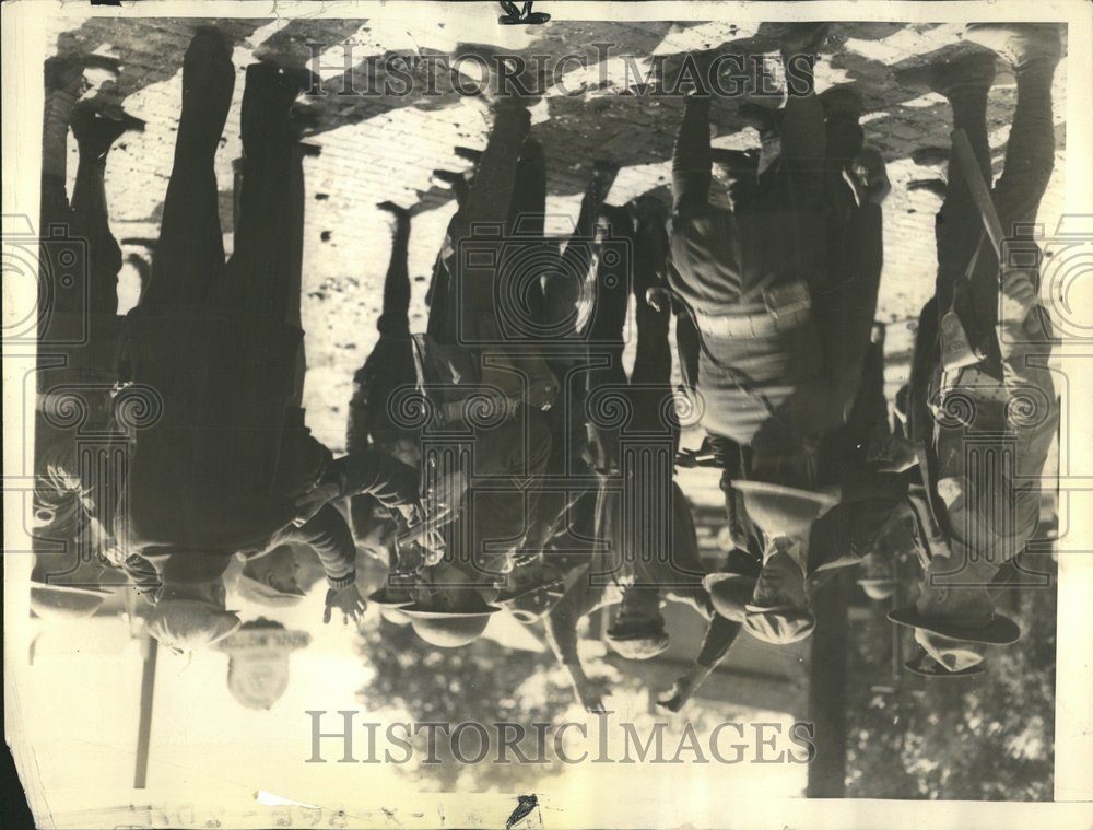 1934 Guardsmen search prisoners after riot - Historic Images