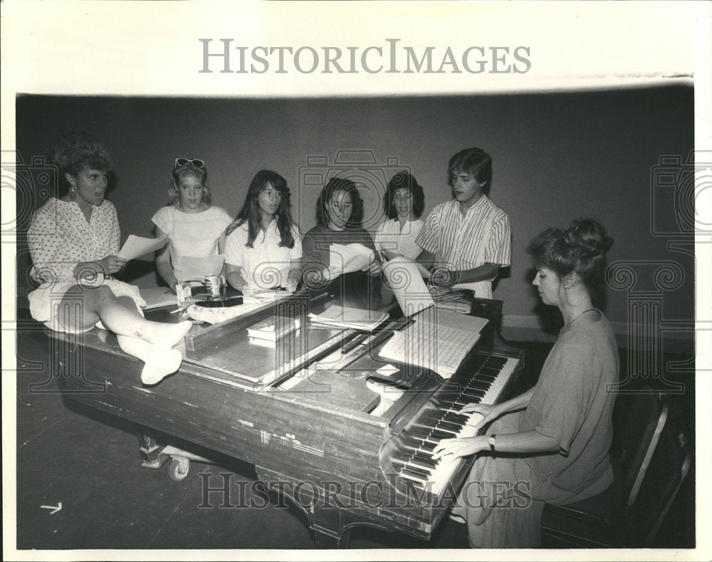 1987 Students around instructor May - Historic Images