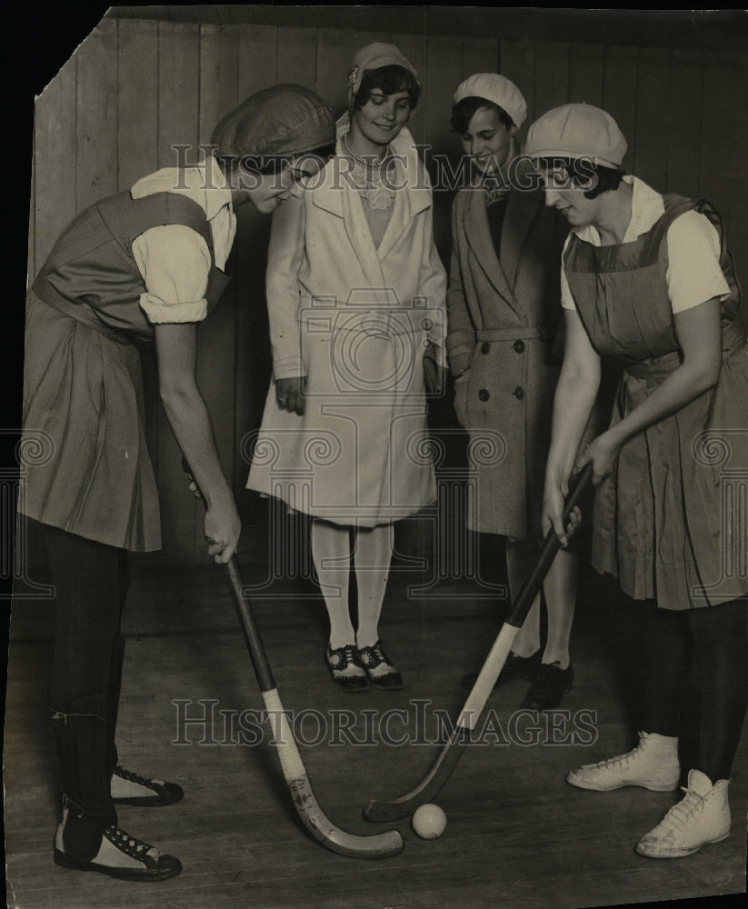 1930 Teenage Girls Play Indoor Hockey - Historic Images