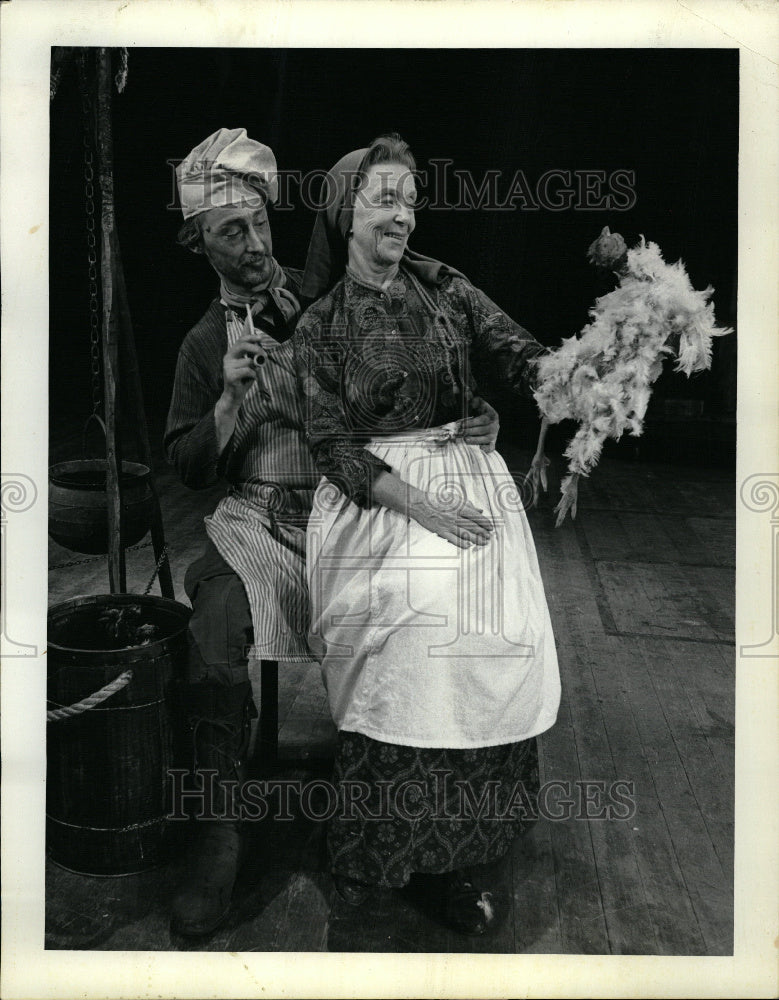 1964 Mother Courage: Cook holds mother - Historic Images