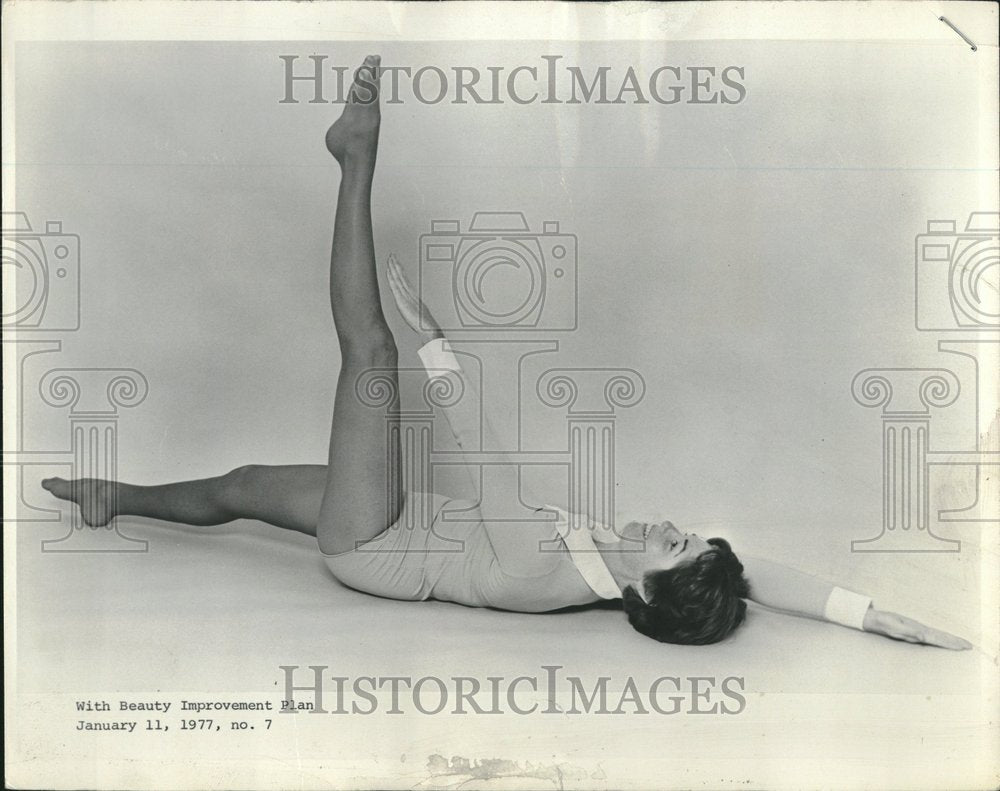 1977 Exercise Legs Straight Touch Toes - Historic Images