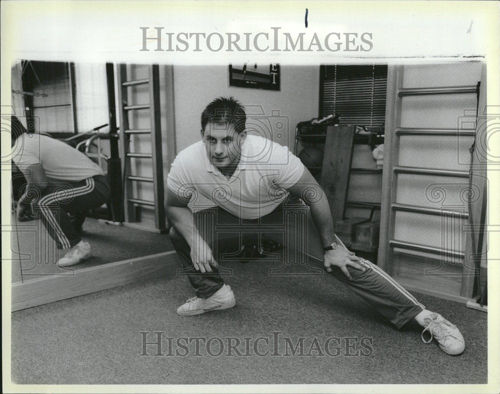 1988 Exercising Groin Stretch Millions - Historic Images