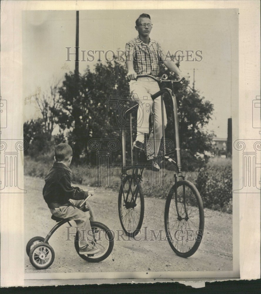 1962 John Parr riding bicycle he fashioned - Historic Images