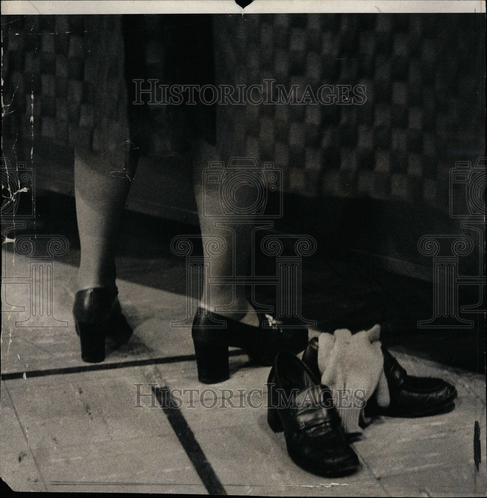 1974 Ghost Voter Shoes Sit Inside Booth - Historic Images