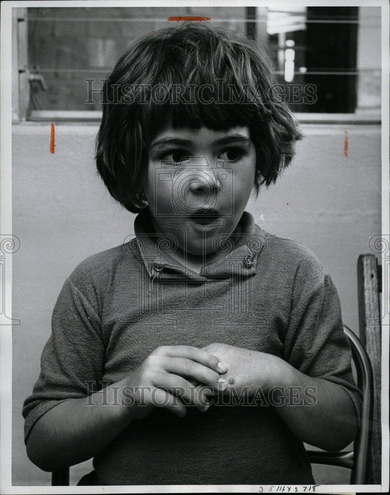 1963 Child Tastes Olives For First Time - Historic Images