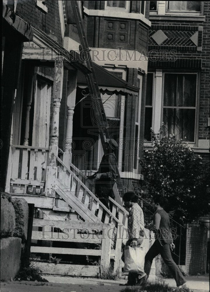 1975 Division Street Chicago Man Paints - Historic Images