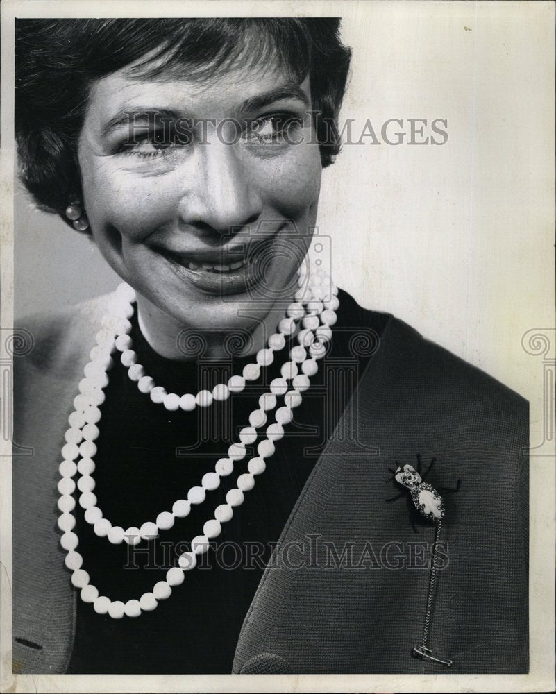 1963 Jeweled Beetle on Woman Suit - Historic Images