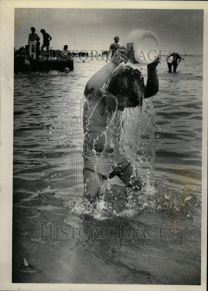 1981 Oak City Beach Youngster Cools Off - Historic Images