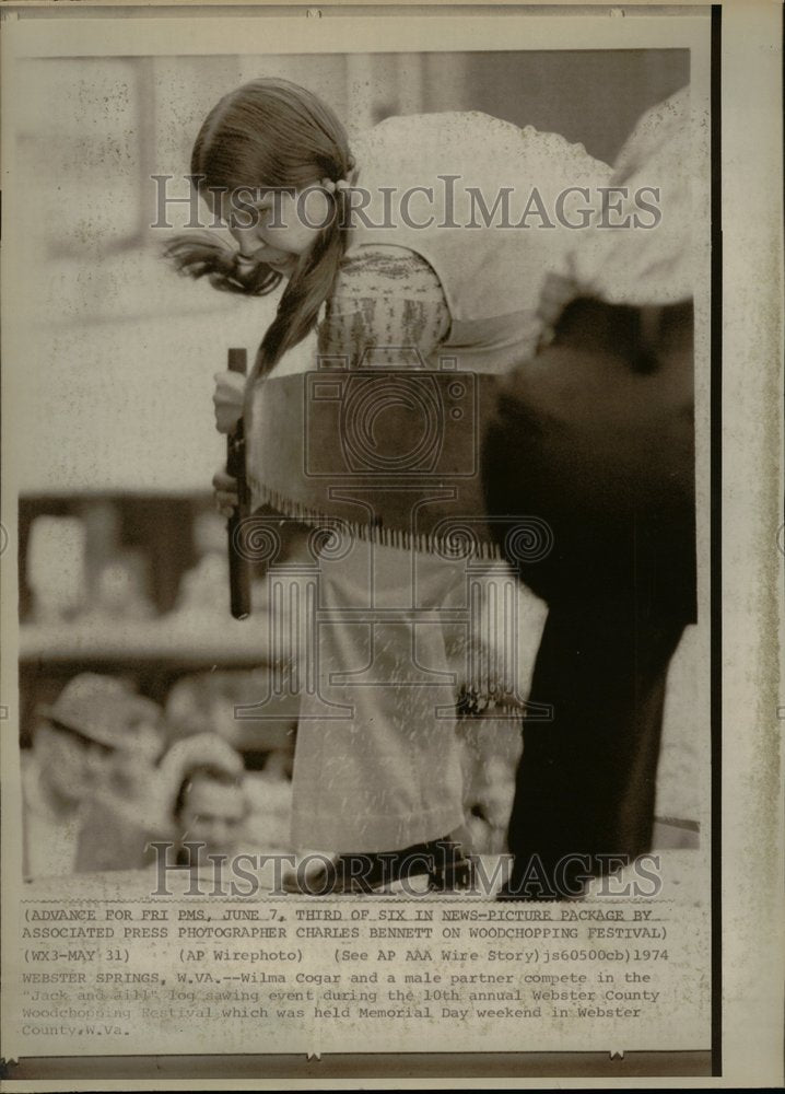 1974 Woman And Man Competing Log Sawing - Historic Images