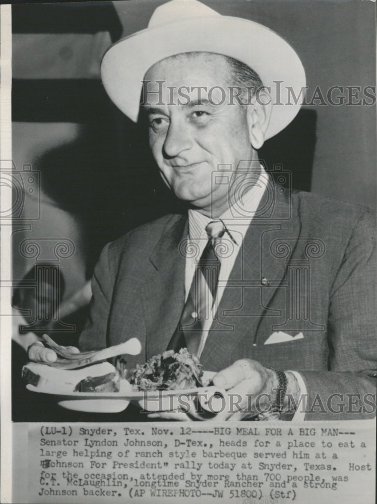 1959 Sen Johnson with large helping - Historic Images