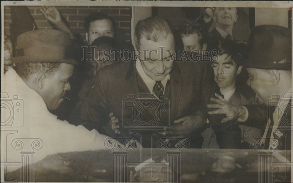 1968 Sen. Eugene McCarthy Escorted To Car - Historic Images