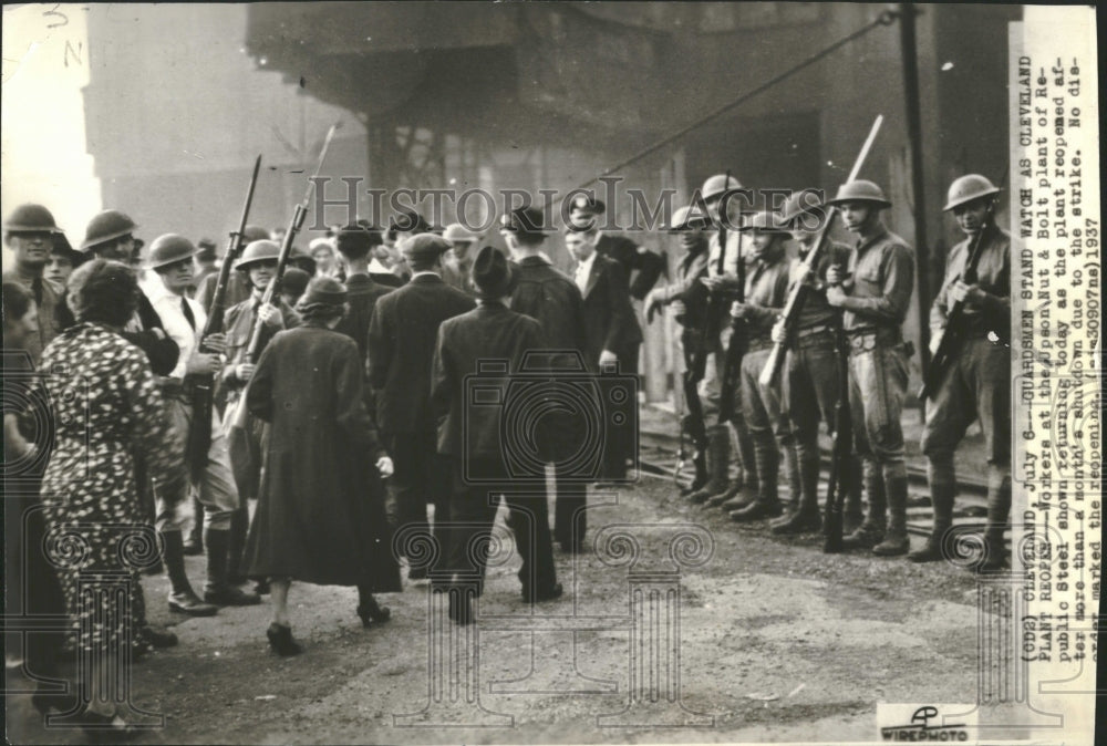 1937 Guardmen stand watch as plant reopen - Historic Images