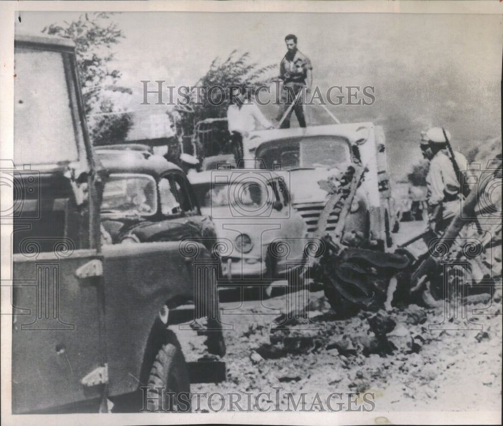 1958 Soldiers stand guard beside wreckage - Historic Images