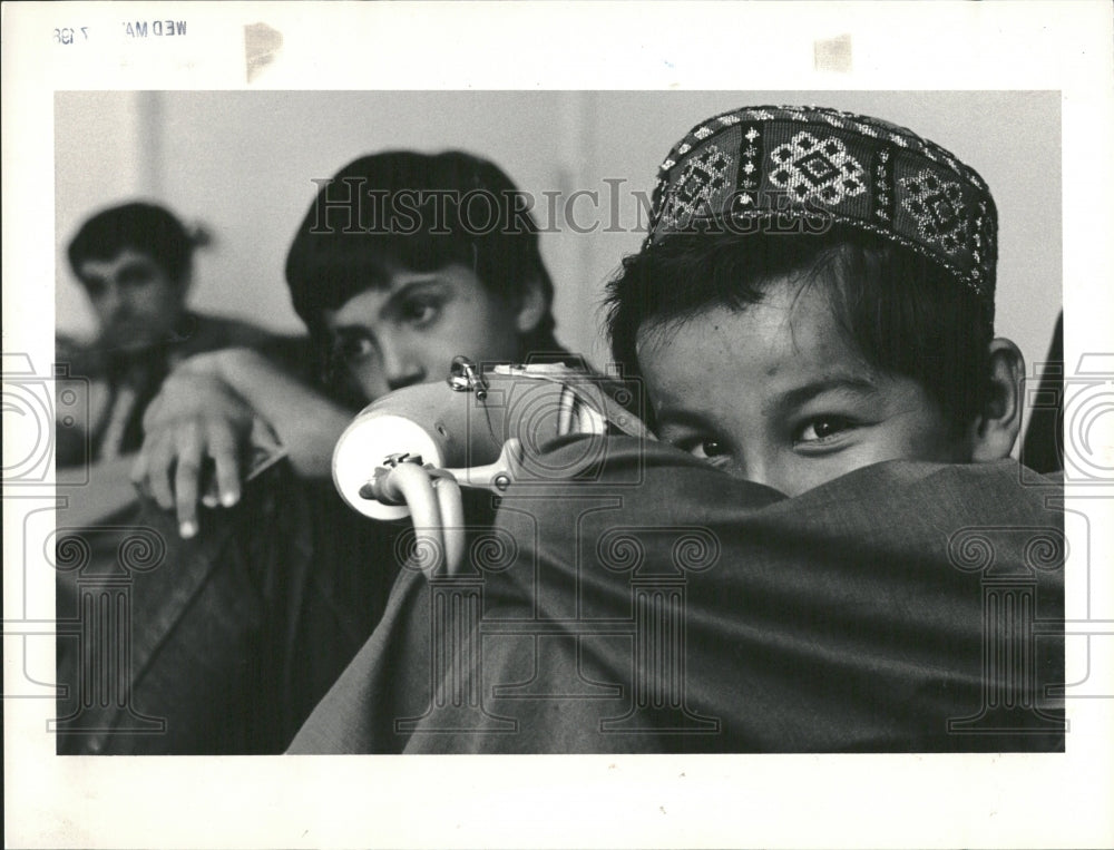 1987 Khaliq receving treatment in US - Historic Images