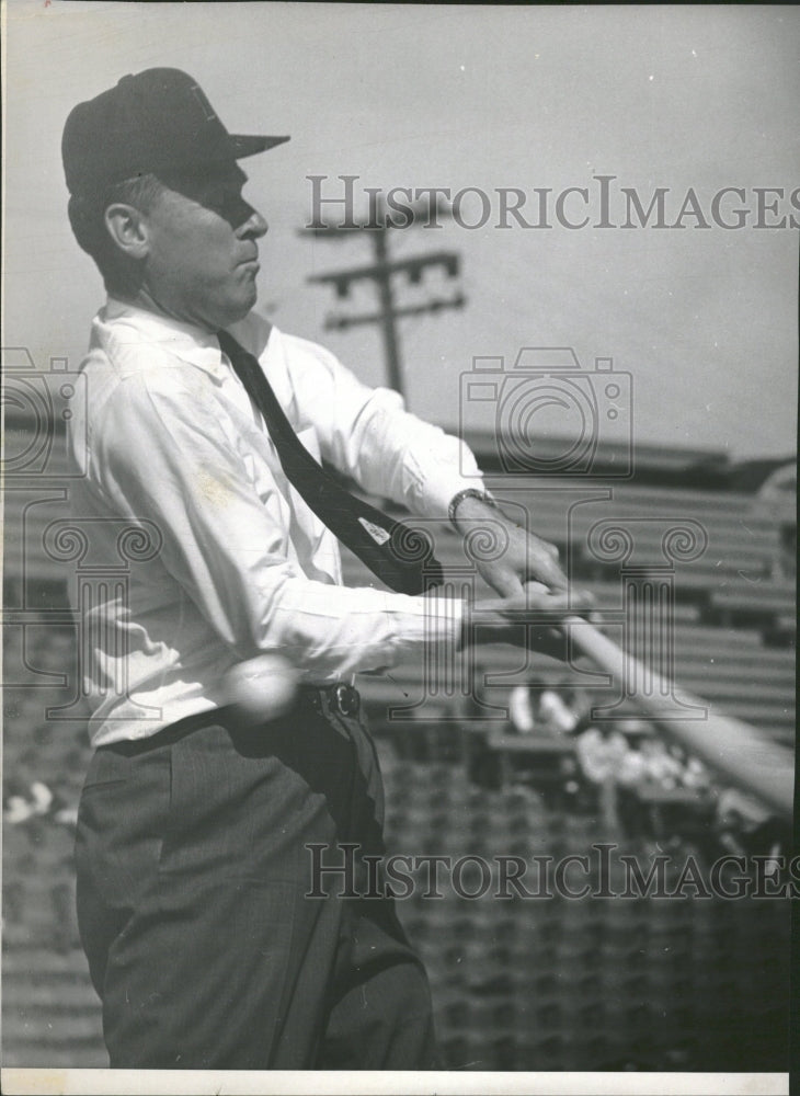 John Love Swinging Bat and Missing Ball - Historic Images