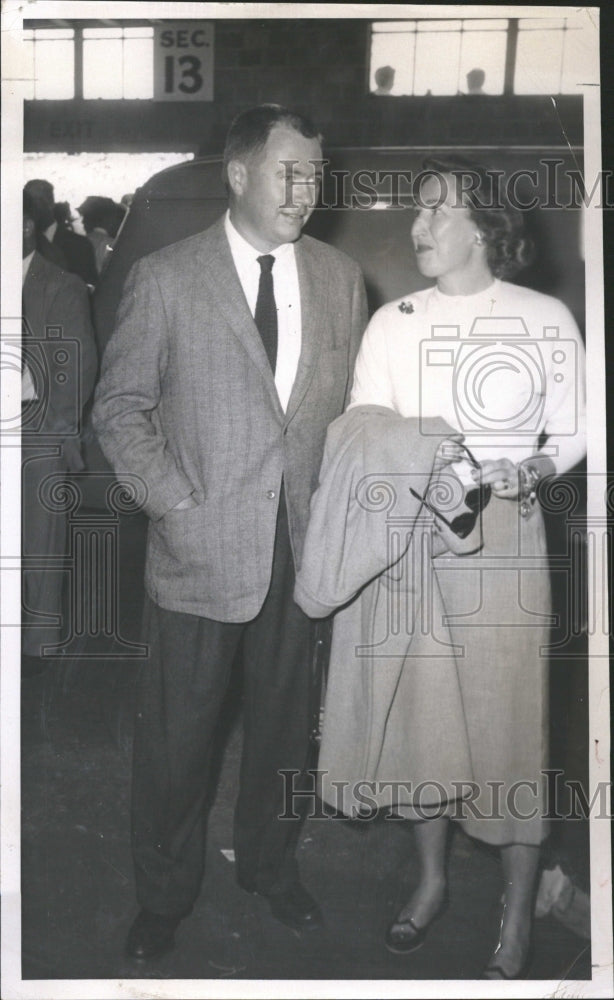 1957 Mr. and Mrs. Gerald Hillyard at game - Historic Images