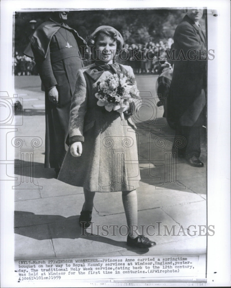 1959 Princess Anne carrying a spring time bouquet at Royal Maundy - Historic Images