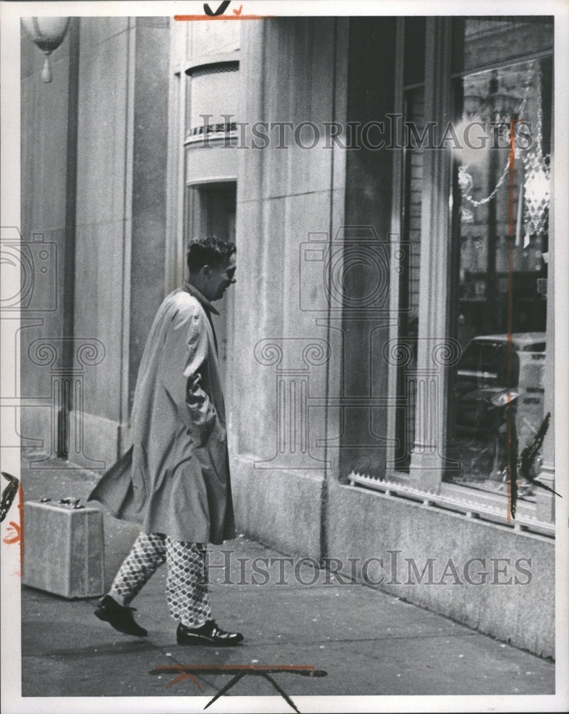 1965 Man in Pajamas WIndow shopping Statler - Historic Images