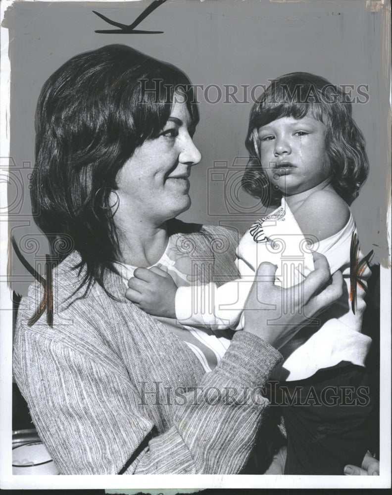 1973 Child Crying Thought Shot With Mother - Historic Images