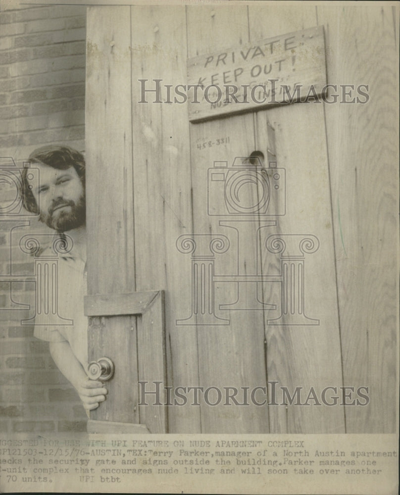 1976 Terry Parker Secures Apartment Gates - Historic Images