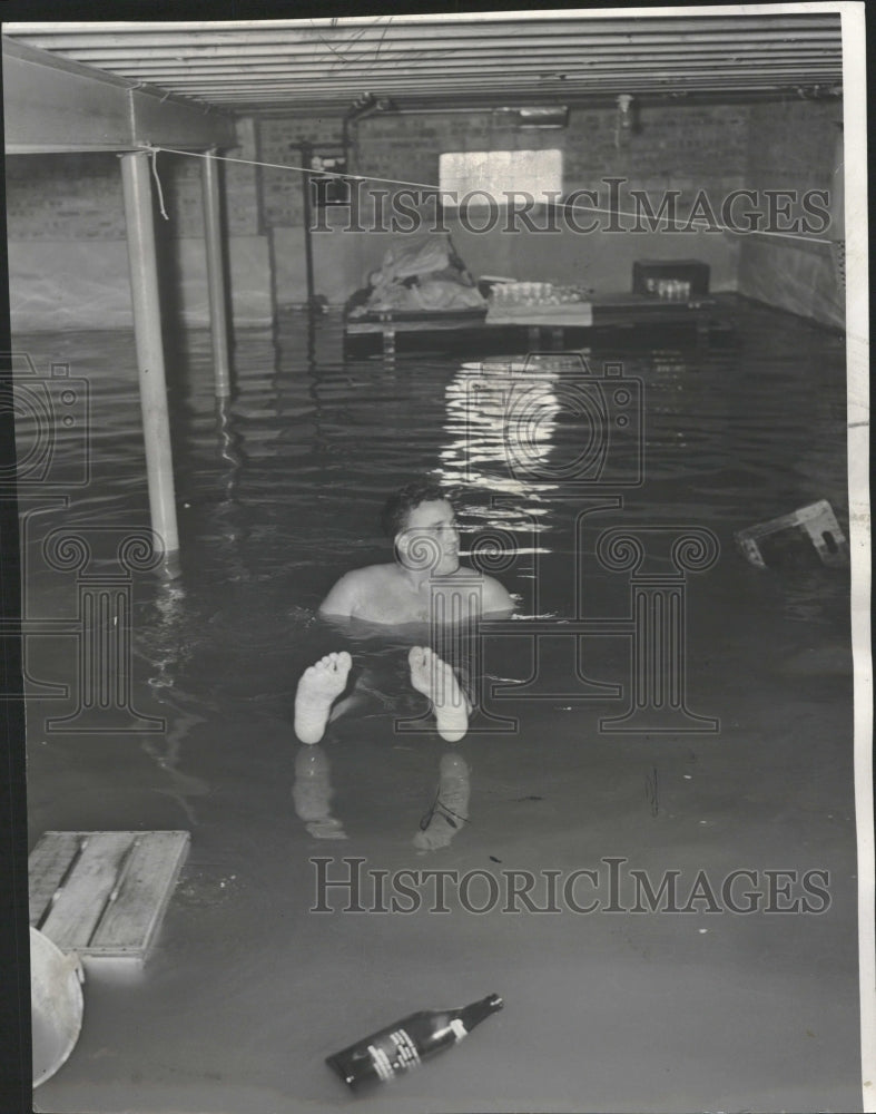 1954 George Wolff Swims In Flooded Basement - Historic Images