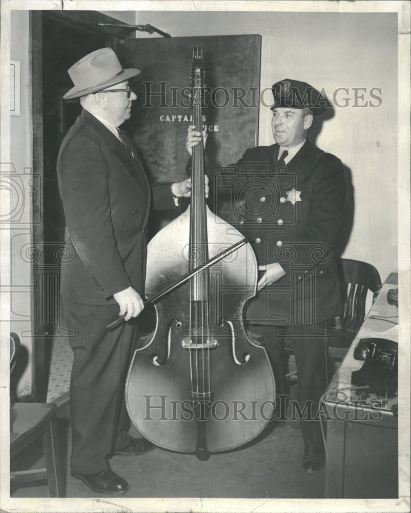 1954 Capt. William Hennessy Plays Bass Viol - Historic Images