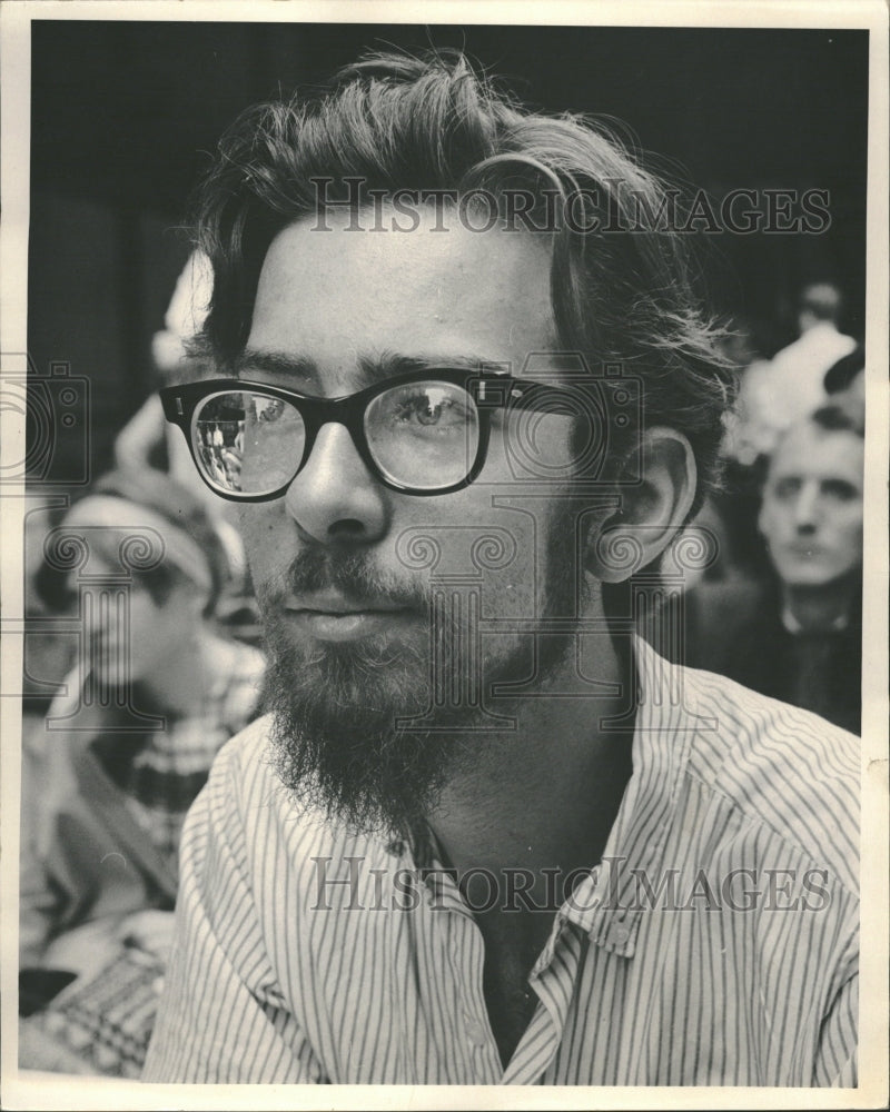 1965 Photo of a young man with a long beard - Historic Images