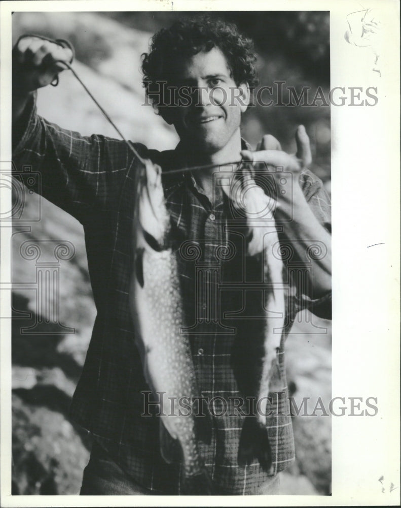 1982 Fisherman Catches Bass Muskies Pike - Historic Images