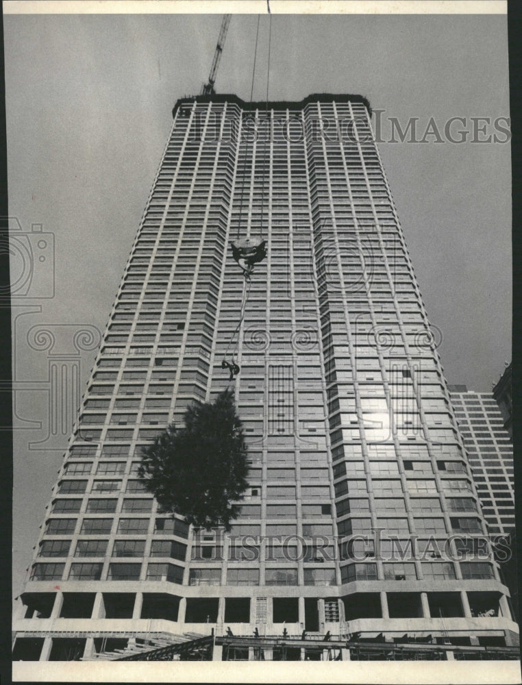 1976 Topping off River Plaza hoisted week - Historic Images