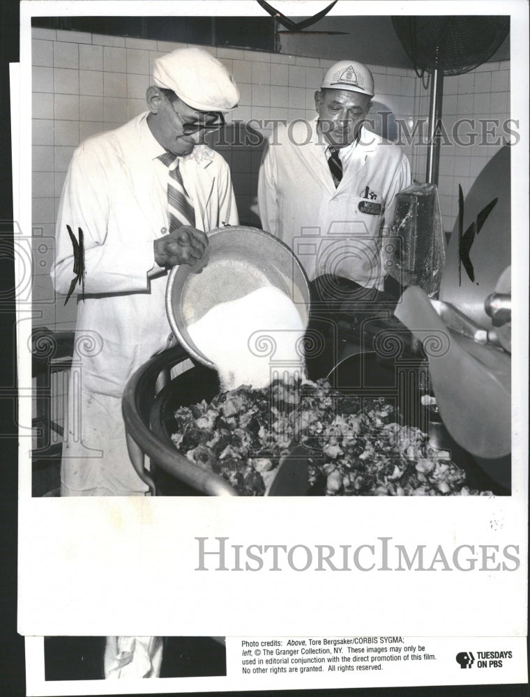 2001 Workers Preparing Food In Mixer - Historic Images