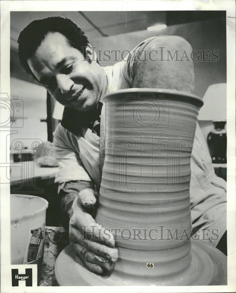 1977 Molding clay into pottery - Historic Images