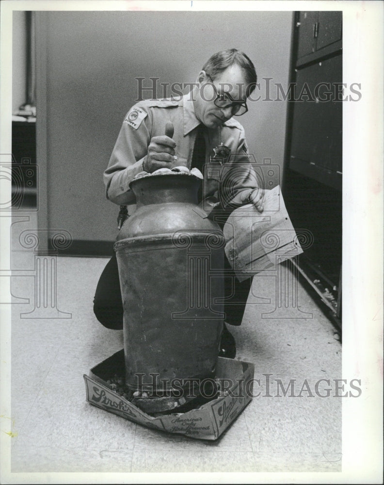 1982 James Glenn,concrete-filled milk can - Historic Images