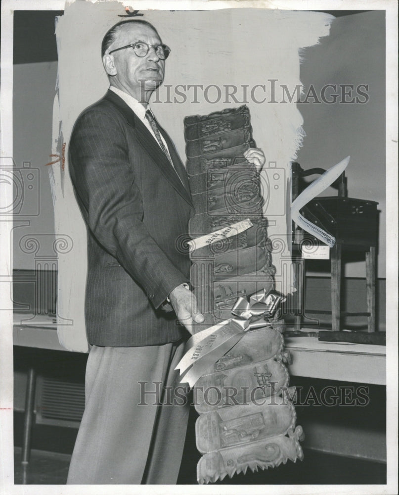 1958 Alexander J. Sheiko Holds Art Piece - Historic Images