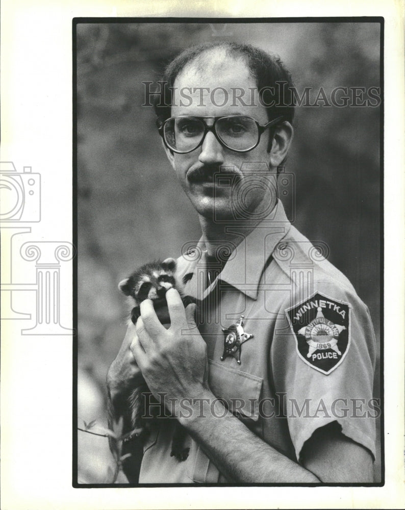 1983 Craig Tisdale With a Raccoon He Found - Historic Images