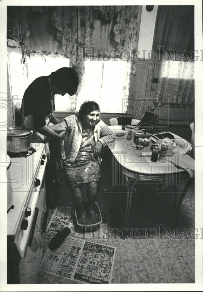 1979 Home Visit Nurse Eileen Holroyd Treats - Historic Images