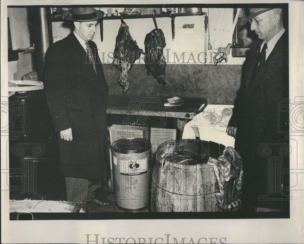 1948 Inspectors view horse meat in shop - Historic Images