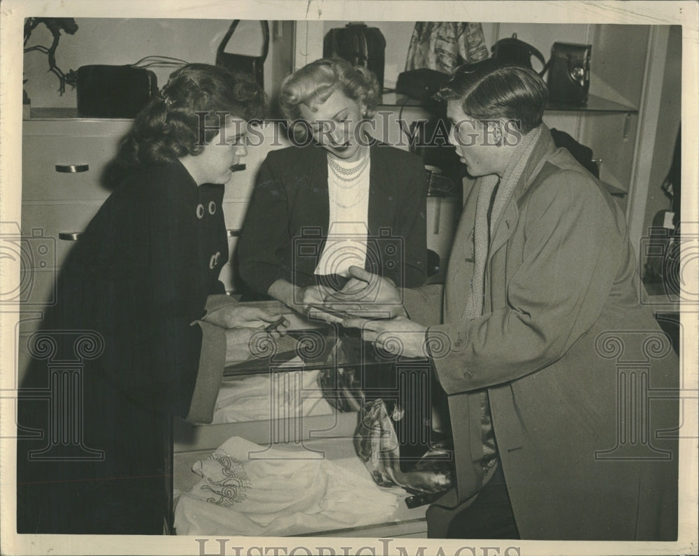 1949 Dress Shop Owner Makes Stock Deal - Historic Images