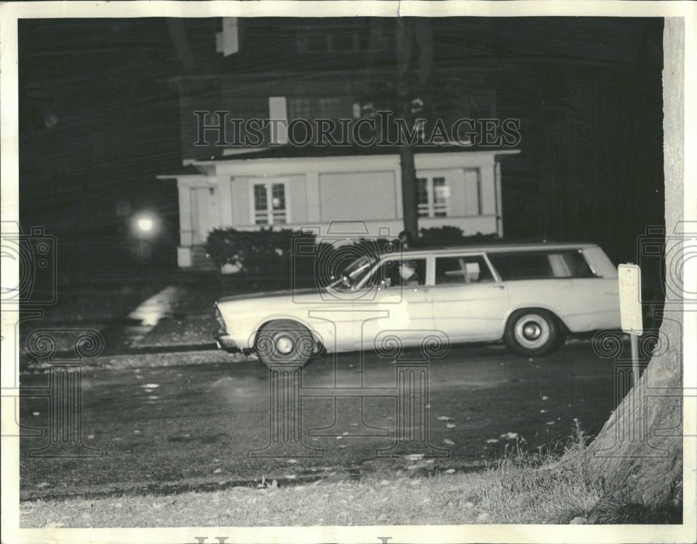 1966 police car patrols street Kenilworth - Historic Images