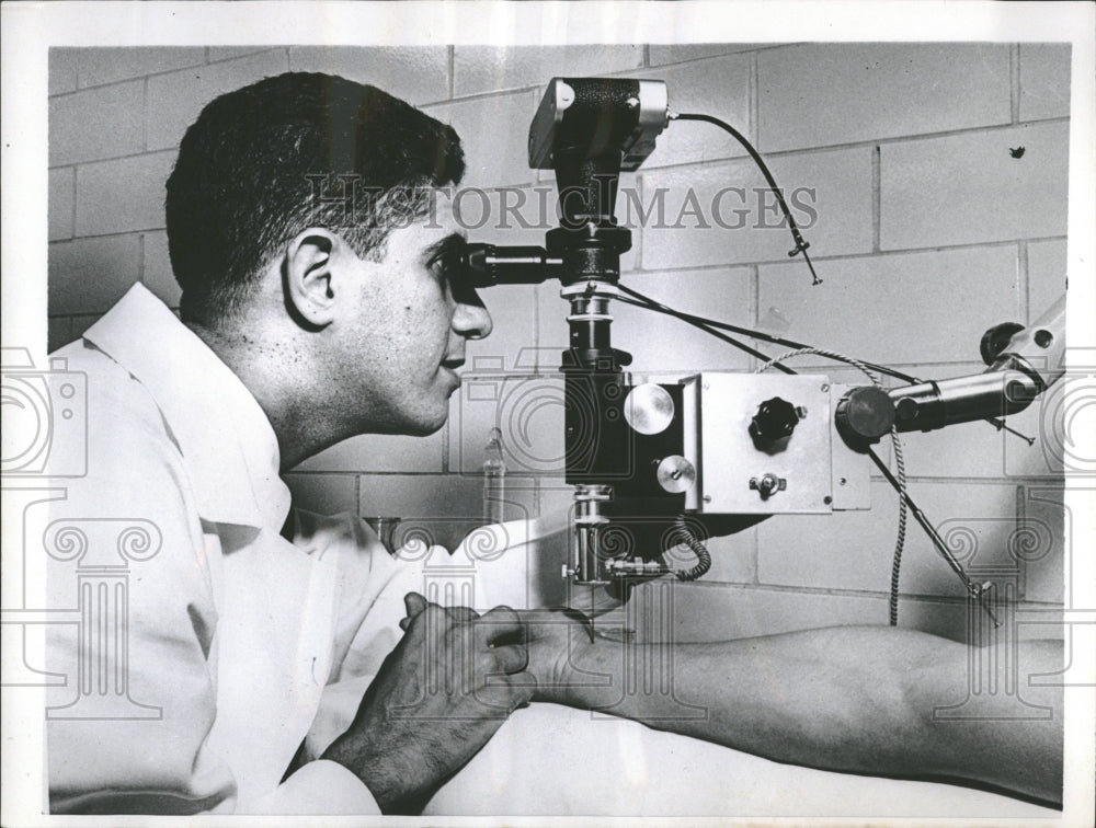 A Hypodermic Needle Syringe Injection - Historic Images