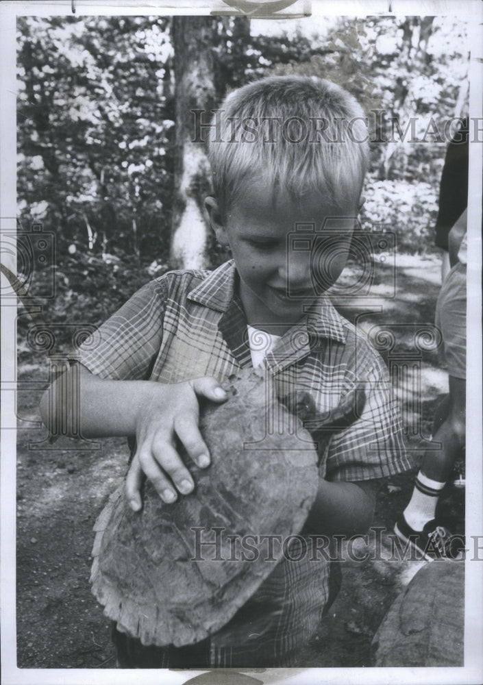 1967, Paul Nicholson Holds a Turtle Camp - RRU03857 - Historic Images