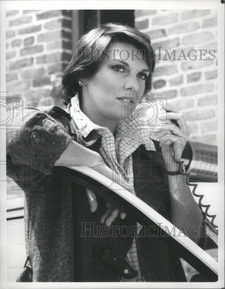 1987, Actress Tyne Daly Police Car Radio - RRU05455 - Historic Images