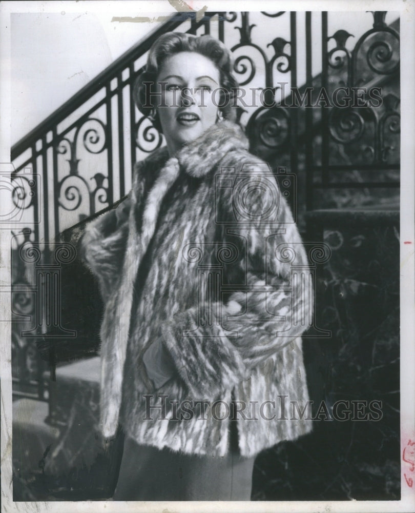 1960 Modeling a coat from Montgomery Wards - Historic Images