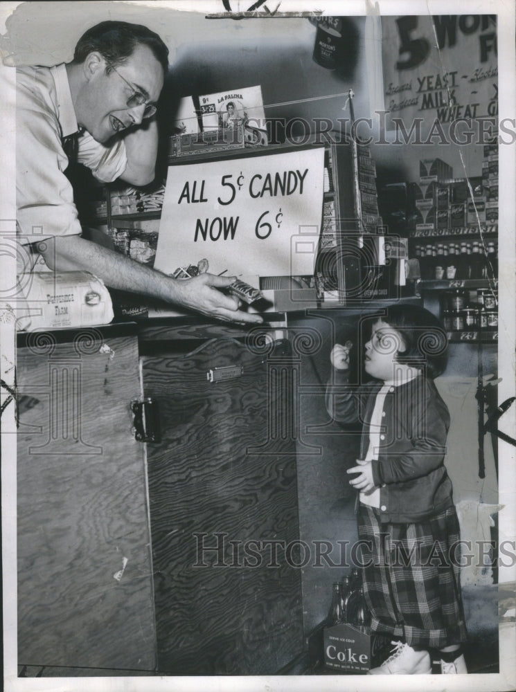 1950, Laurie Delaney Buys Candy Bob Moguin - RRU08455 - Historic Images