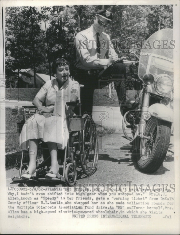 1962 high speed electric-powered Wheelchair - Historic Images