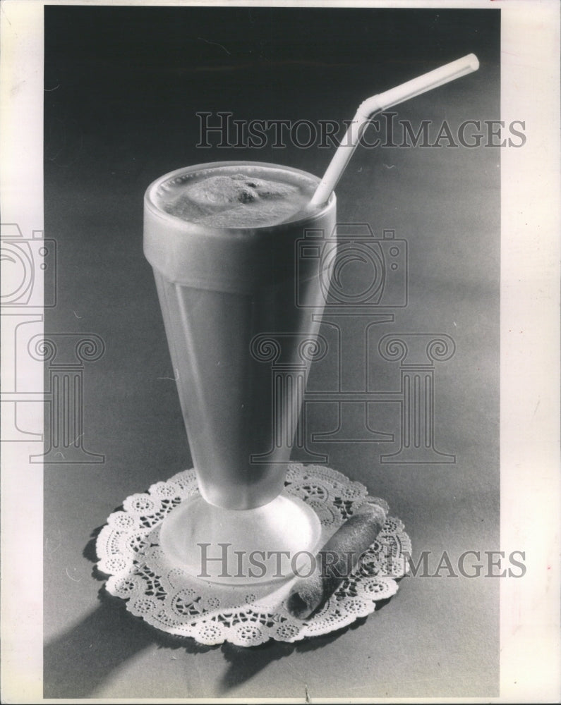 1988, Malted milk drink tall glass straw - RRU14741 - Historic Images