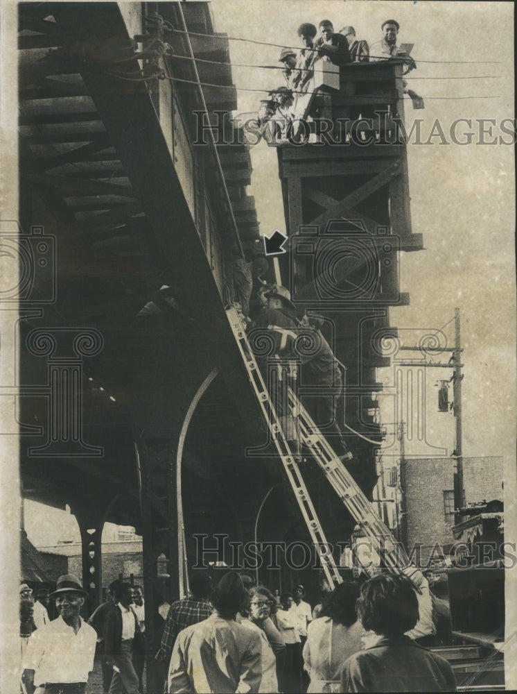 1969 Press Photo Fireman Rescue Man From Train Track - RRU17085 - Historic Images