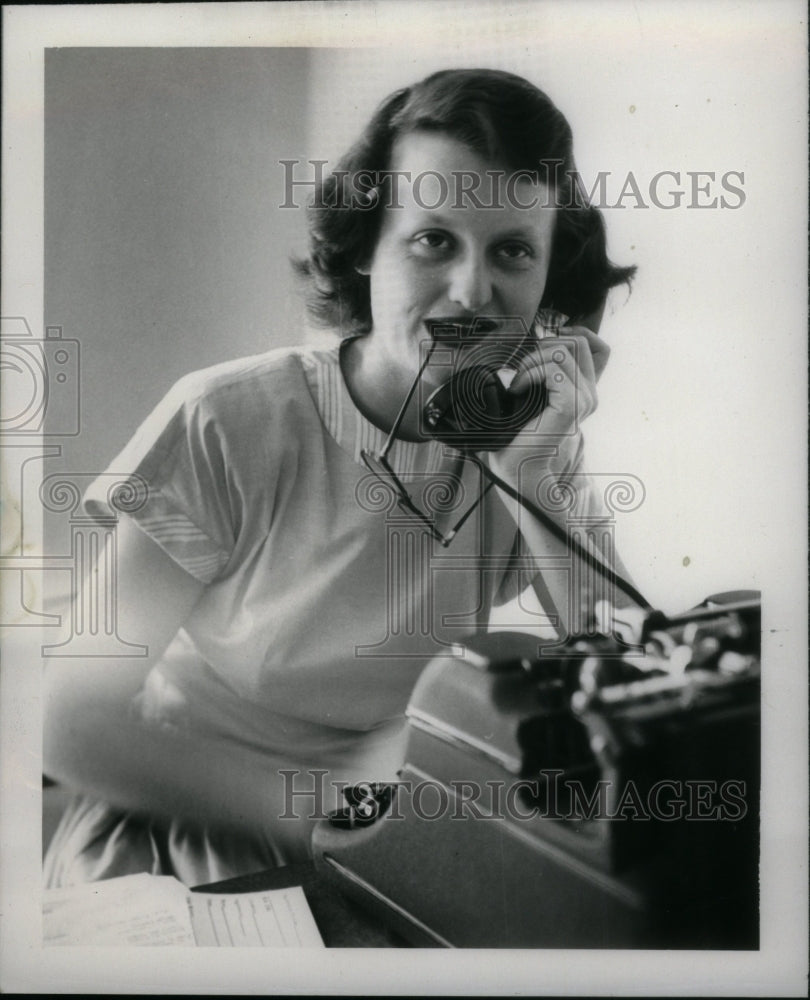 1948, Woman Answering Phone Nicholson - RRU21513 - Historic Images