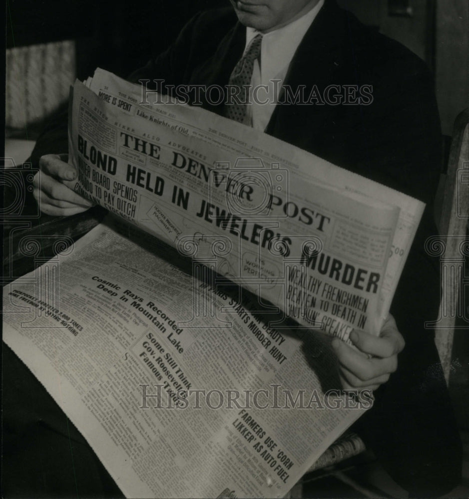 1932 Oscar Alb. Carlson reading Denver Post - Historic Images